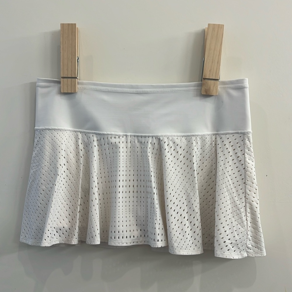 Athleta skort with ball pockets.
